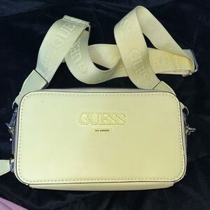 Pastel yellow guess cross body bag